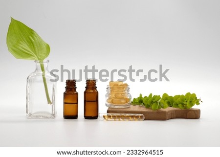 Oils, herbs, vitamins and equipment for skin care, healthy lifestyle, massage and spa treatments, on white background