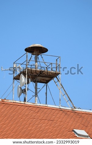 Air defence siren on the top of a building