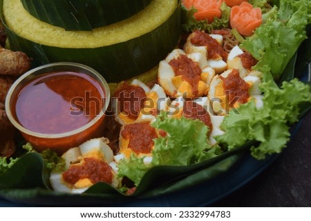 Sambal Egg or egg with chili souce made from eggs, chilies, garlic, shallots, tomatoes