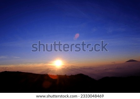 Where the Mountains Kiss the Sky: A Sunrise Spectacle From the top of mountain with amazing colors and some silhouette 