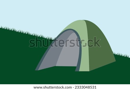 Green meadow on a hill with green tent