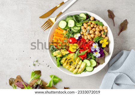 Vegan Buddha Bowl with Chickpeas, Avocado and Fresh Vegetables, Healthy Eating, Tasty Vegetarian Meal