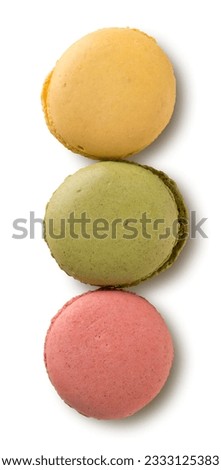 Caramel macarons isolated on a white background