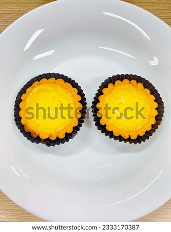 Two pieces of delicious egg tart
