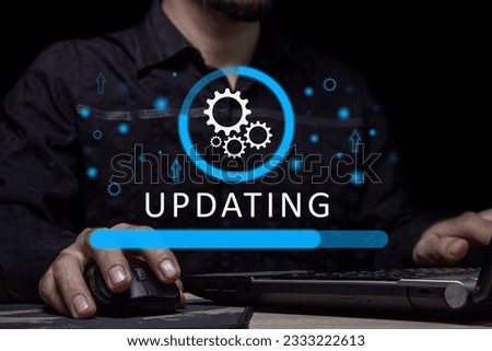 Operating system updates, application installation and software update process. Modernization of user equipment, updating modern functions. Download process Royalty-Free Stock Photo #2333222613