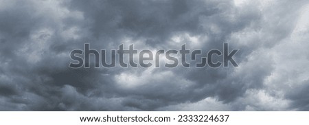 Dramatic sky with dark dense clouds before a thunderstorm