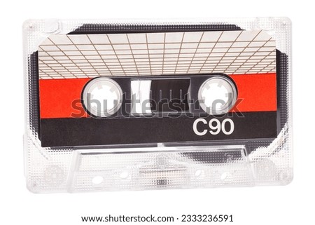 Audio cassette tape isolated on white background, vintage 80's music concept Royalty-Free Stock Photo #2333236591