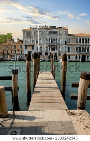 Small wooden jetty on Grand Canal in Venice
