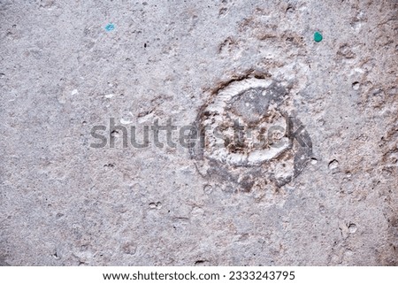 Texture of old concrete wall with dents for background. The image contains the effect of black and white tones.