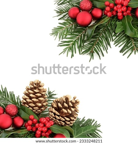 Christmas border with flora and red baubles, holly, ivy, gold pine cones and winter greenery over white background.
