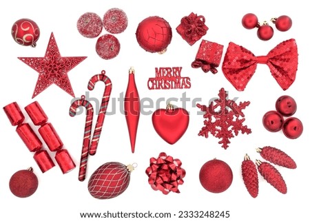 Red christmas tree bauble decorations over white background.