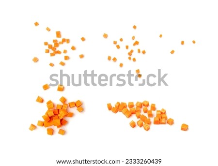 Fresh Diced Carrot Isolated, Raw Carrot Cubes Closeup, Chopped Orange Root Vegetable, Diced Carrots Pile on White Background Top View Royalty-Free Stock Photo #2333260439