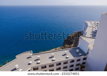 Beautiful aerial view of hotel and vast expanse of Atlantic Ocean of island of Gran Canaria. Spain.