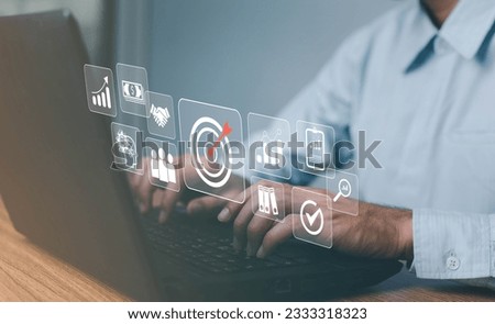 Targeting the business concept, target with digital marketing icons on virtual screen internet network connection, Business goal, Digital marketing, online business, Set goals for better results. Royalty-Free Stock Photo #2333318323