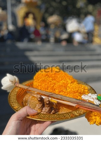 The invention of flowers, incense and candles to worship the sacred according to the beliefs of Thai people