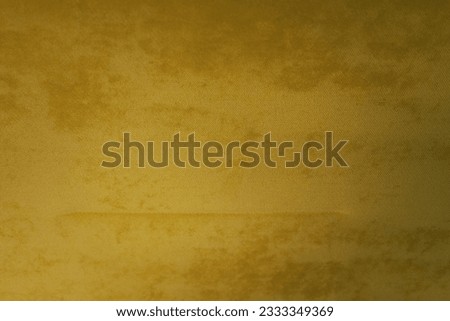 Yellow velvet fabric texture used as the background. Empty yellow fabric background of soft and smooth textile. There is space for text. Royalty-Free Stock Photo #2333349369