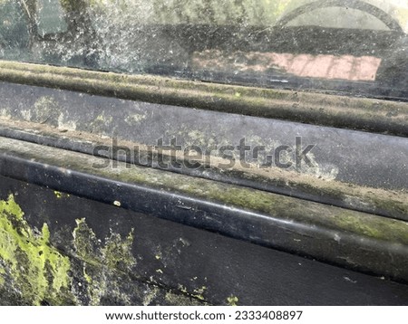 defocused and blur dust on car glass surface