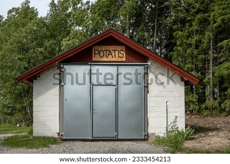 Falun, Sweden A small farm building with a sign saying potatis, or potatoes in Swedish translation.