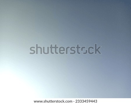 Ethereal blue sky with infinite horizon and peaceful empty space.
