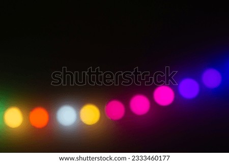 Bulb LED bokeh on dark background, blur light color on dark background