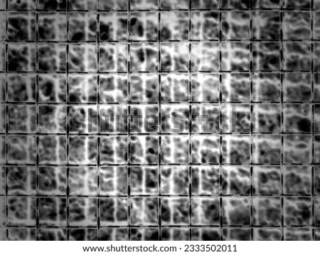 Grey patterns in shape of square grid, with central vignetting