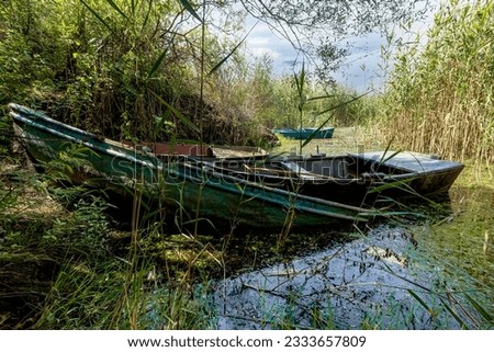 Aydin, Türkiye, view of Azap Lake. Abandoned boats by the lake. The problem of water pollution and drought.