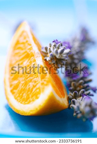 close up of orange with lavender