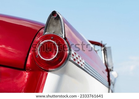 close up of 1960s red convertible car in Cuba. Horizontal shape, copy space