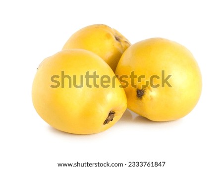 Three quinces isolated on a white background