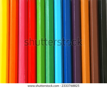 Wooden colour pencils close-up background.