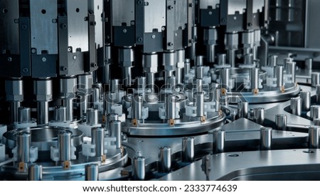 Lithium-ion Cells for High-voltage Electric Vehicle Batteries Manufacturing Process. Battery Cells for Automotive Industry on Production Line. High Capacity Battery on Conveyor. Royalty-Free Stock Photo #2333774639