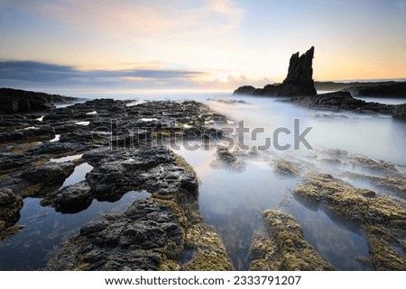 Cathedral Rock, in Kiama, south coast NSW, has a definite resemblance to a cathedral or church. Long exposure calms the waves creating a surreal place. A rock pile ceases to be a rock pile the mome