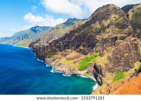 stunning aerial view of na pali coast at kauai island, hawaii from helicopter