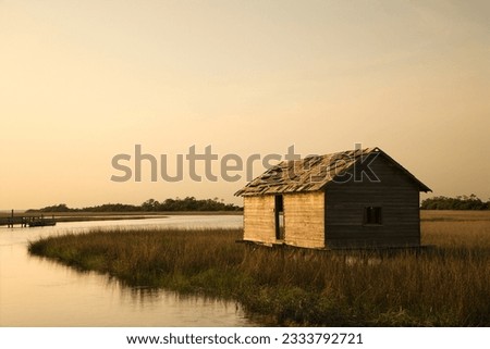 Worn out building in marsh on Bald Head Island, North Carolina.