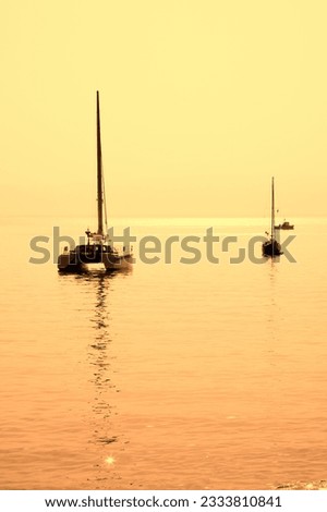 sailing boat anchored in a port in Sardinia