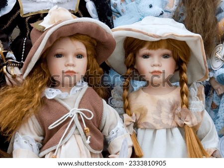 Two pretty dolls on display