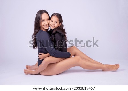 Mother and daughter embraced exchanging affection and affection. mother's day
