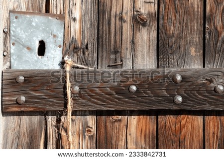 Close up photo of a old wooden door.