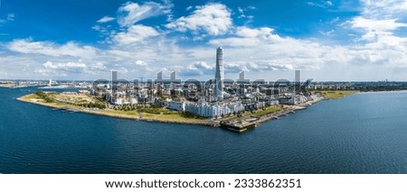 Beautiful aerial panoramic view of the Malmo city in Sweden. Turning Torso skyscraper in Malmo, Sweden. Royalty-Free Stock Photo #2333862351