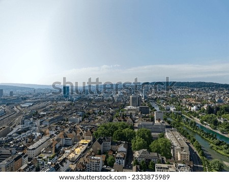 Aerial view of Swiss City of Zürich with Limmat Valley and skyline in the background on a hot sunny summer day. Photo taken July 18th, 2023, Zurich, Switzerland.