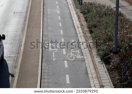 07.17.2023 wroclaw, poland, Cyclists in the city. Bike path in the city with horizontal signs. Bicycle.