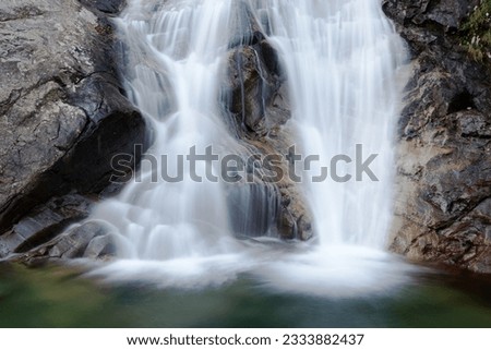 Double waterfall, summer season, horizontal frame- Italy