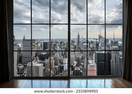 window view of Manhattan cityscape Buildings from High Rise Window - Beautiful Real Estate overlooking Skyscrapers in Gorgeous Breathtaking Penthouse Cityscape in New York City NYC Royalty-Free Stock Photo #2333898903