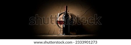 Wine on a background of old clay wall