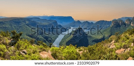 Panorama shot of the Blyde River Canyon, dam and the mountains with lush foliage, Panorama Route, Graskop, Mpumalanga, South Africa Royalty-Free Stock Photo #2333902079