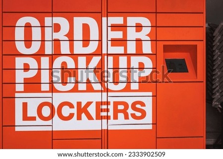 Order pickup lockers outdoor of Home Depot store. The pickup lockers for online orders may be used by customers as a pick up point for mail order goods. Street photo, nobody-June 17,2023-Surrey Canada