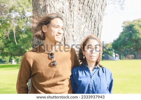 Japanese couple looking in the same direction