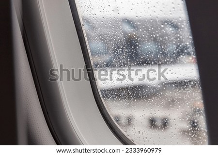 Rain seen through an airplane window