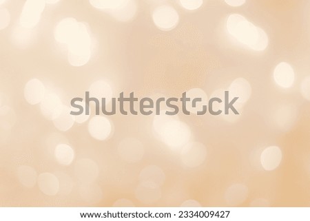 Defocused abstract bokeh background beige pastel colored, flare from lights, beige monochrome photo, blurred round bokeh as holiday fon, celebration wallpaper. Glittering aesthetic textured pattern Royalty-Free Stock Photo #2334009427