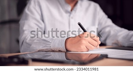 Business Agreements and Approvals ,business contract signing ,Confirmation of contract documents or warranty card ,legal contract ,guarantee correctness ,Signing a form ,Business paperwork 